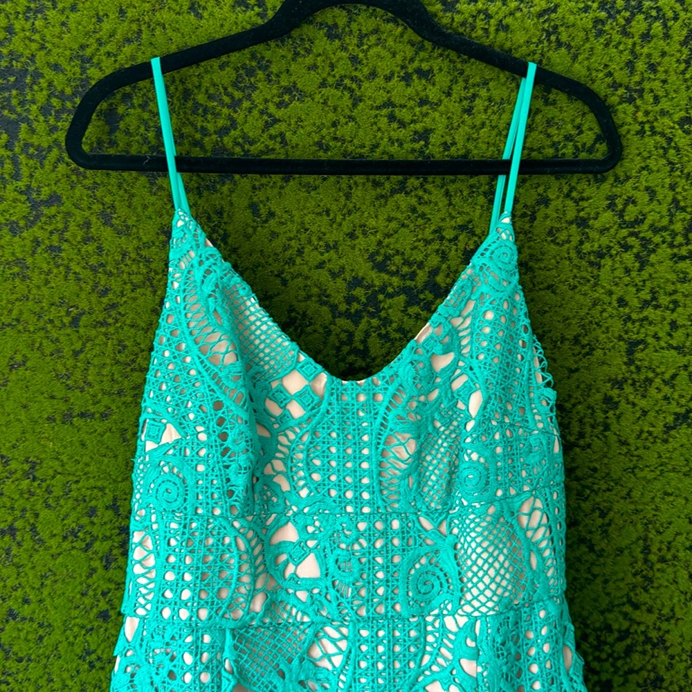 Green lace with a nude slip dress